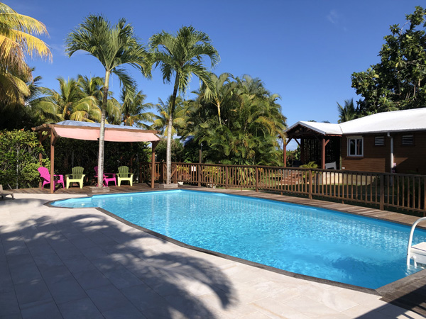 Your cottages in Guadeloupe facing the swimming pool