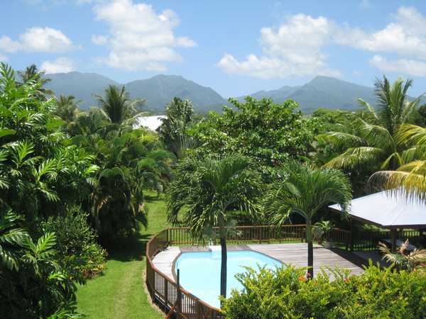 The pool and the carbet mountain side in Lamateliane