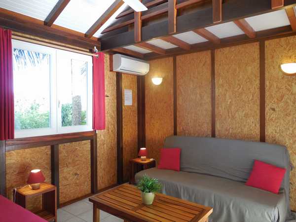 The air conditioned and ventilated living room of each lodging